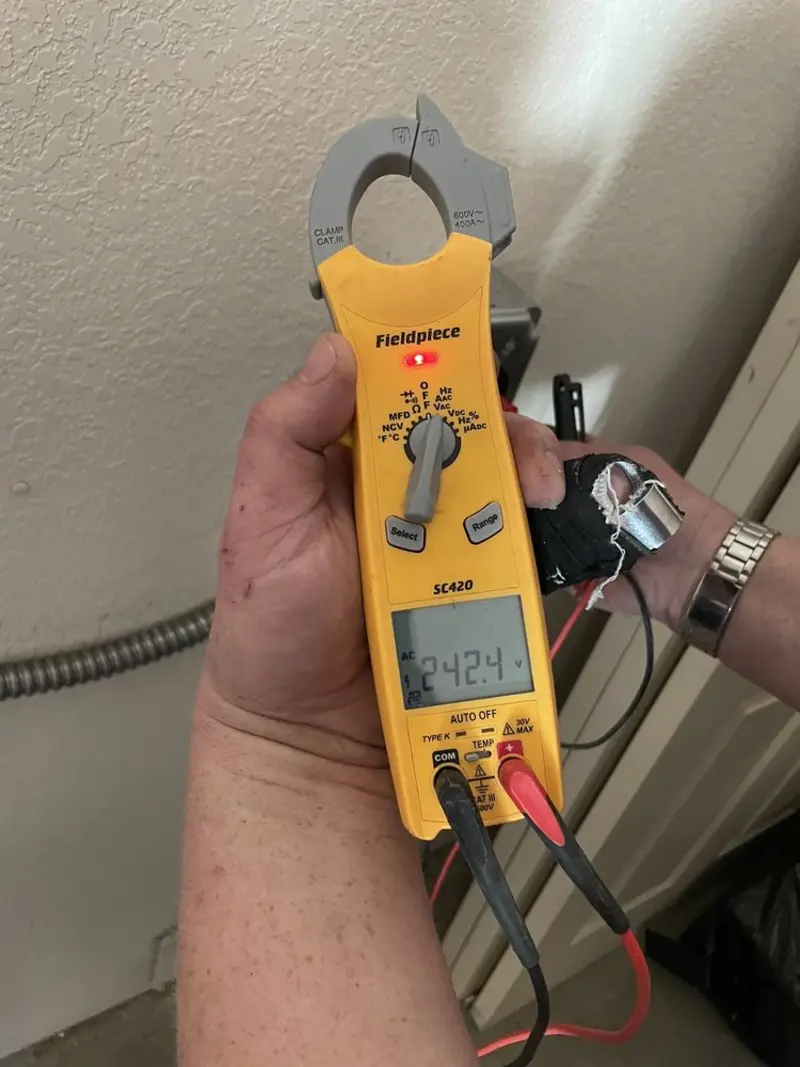 Voltage testing with clamp meter during Aluminum Wiring Replacement in Ashdown